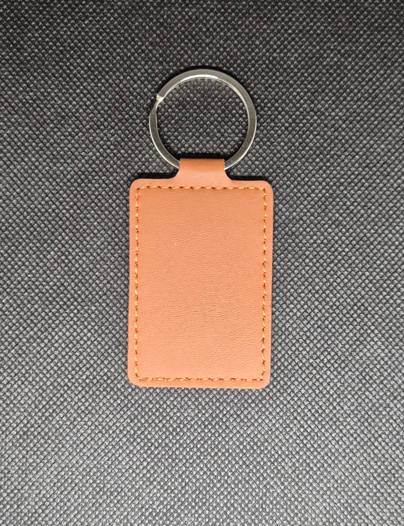 Personliga Nyckelringar i Konstläder med Gravyr eller Tryck